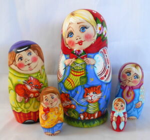 Tatiana knitting sock with kittens Babushka Matryoshka nesting Doll Babooshki Babushkas