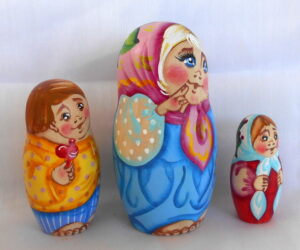 Tatiana knitting sock with kittens nesting Doll Babooshki s