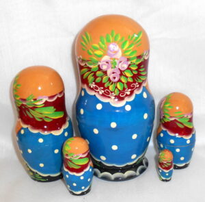 Olga with Khokhloma dishes nesting Doll Babooshki s