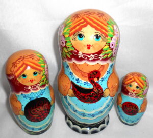 Olga with Khokhloma dishes nesting Doll Babooshki s