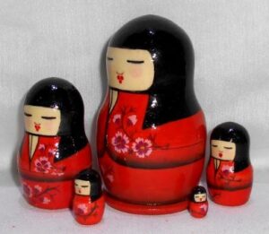 Geisha Kokeshi in orange kimono small nesting Doll Babooshki s