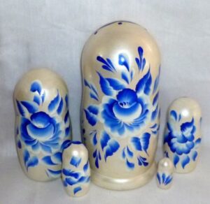 Zina in blue flowers dress nesting Doll Babooshki s