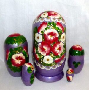 Ksenia in floral purple dress nesting Doll Babooshki s