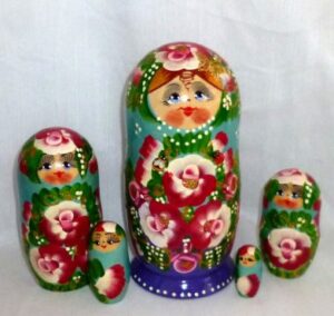 Ksenia in floral blue dress Babushka Matryoshka nesting Doll Babooshki Babushkas