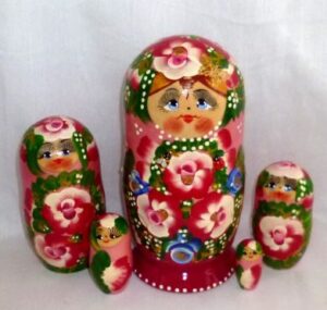 Ksenia in floral red dress Babushka Matryoshka nesting Doll Babooshki Babushkas