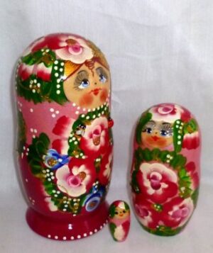Ksenia in floral red dress nesting Doll Babooshki s