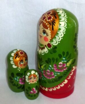 Shura in floral green dress nesting Doll Babooshki s