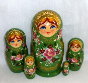 Dina in green dress M Babushka Matryoshka nesting Doll Babooshki Babushkas