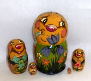 Funny lady-bug with straw Babushka Matryoshka nesting Doll Babooshki Babushkas