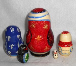 Santa with burgundy bag small nesting Doll Babooshki s