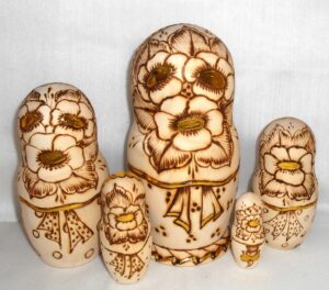 Anfisa with gold leaves and kittens in basket nesting Doll Babooshki s