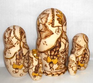 Anfisa with gold leaves and kittens in basket nesting Doll Babooshki s