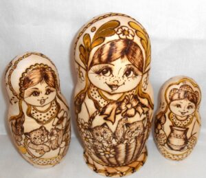 Anfisa with gold leaves and kittens in basket nesting Doll Babooshki s