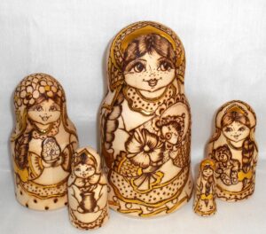 Anfisa with her baby bell shape A Babushka Matryoshka nesting Doll Babooshki Babushkas