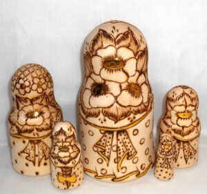 Anfisa with her baby bell shape A nesting Doll Babooshki s
