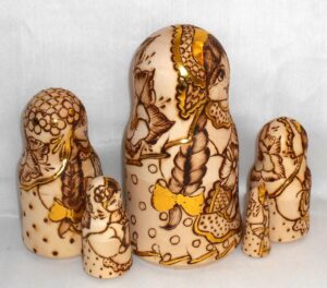 Anfisa with her baby bell shape A nesting Doll Babooshki s
