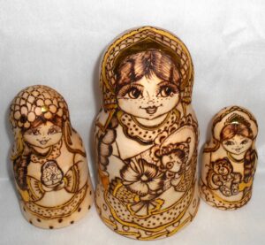 Anfisa with her baby bell shape A nesting Doll Babooshki s