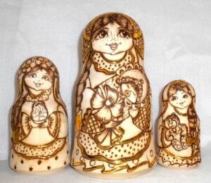 Anfisa with her baby bell shape A nesting Doll Babooshki s