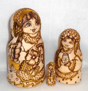 Anfisa with her baby bell shape A nesting Doll Babooshki s