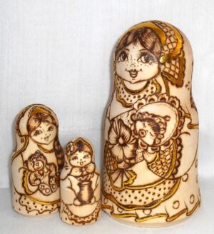 Anfisa with her baby bell shape A nesting Doll Babooshki s