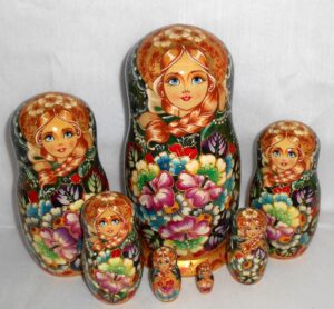 Stella Golden girl in green scarf 7-set Babushka Matryoshka nesting Doll Babooshki Babushkas