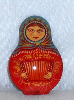 Katya with harmonica red dress Brooch