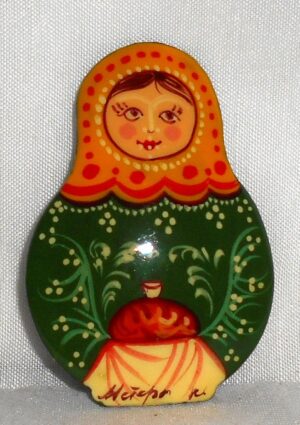 Katya with Bread & Salt green dress Brooch
