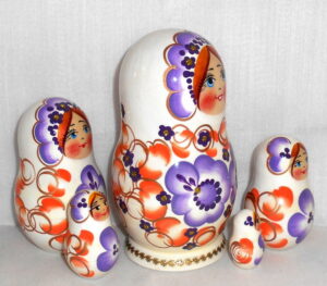 Klava in floral white dress purple flowers nesting Doll Babooshki s