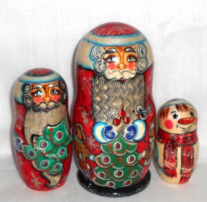 Santa with children around Xmas tree nesting Doll Babooshki s