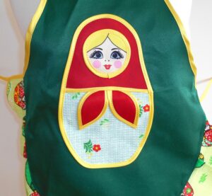 Kids Apron Green nesting Doll Babooshki s