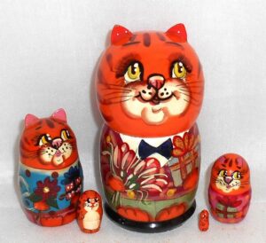 Funny orange cat with bunch of flowers small Babushka Matryoshka nesting Doll Babooshki Babushkas