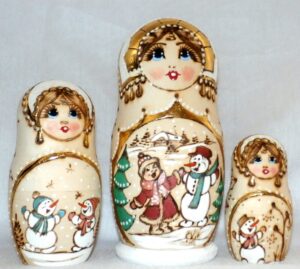 Girl and snowman winter scene nesting Doll Babooshki s