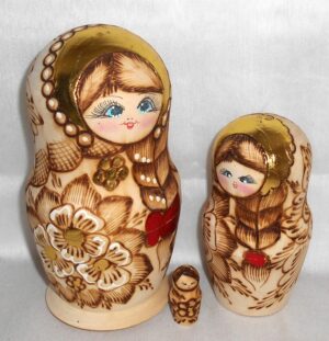 Girl with plait & red bow nesting Doll Babooshki s
