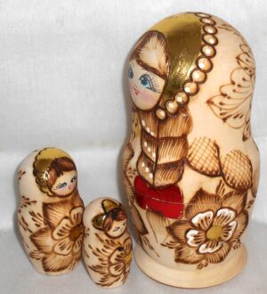 Girl with plait & red bow nesting Doll Babooshki s