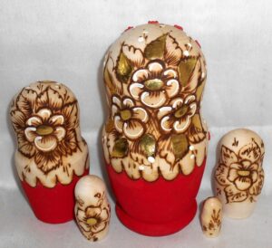 Girl with golden flowers basket nesting Doll Babooshki s