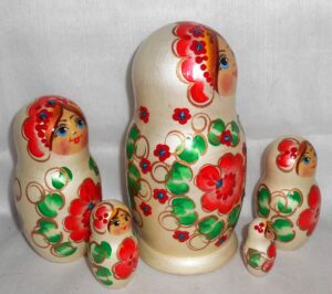 Anfisa in red flower dress nesting Doll Babooshki s