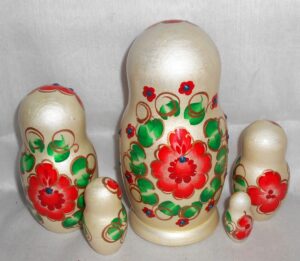 Anfisa in red flower dress nesting Doll Babooshki s