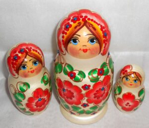 Anfisa in red flower dress nesting Doll Babooshki s