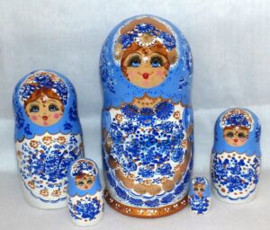 Anya in white dress blue scarf Babushka Matryoshka nesting Doll Babooshki Babushkas