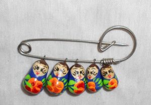 pin blue with yellow-red flowers Babooshki s