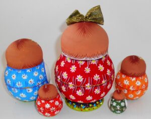 Village girl in red Matty with rabbit gold bow nesting Doll Babooshki s