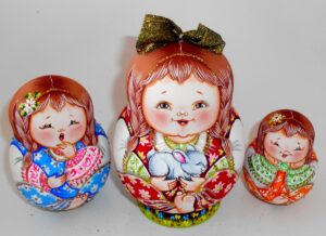 Village girl in red Matty with rabbit gold bow nesting Doll Babooshki s