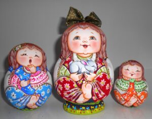 Village girl in red Matty with rabbit gold bow nesting Doll Babooshki s