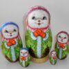 Rabbit in green coat nesting Doll Babooshki s