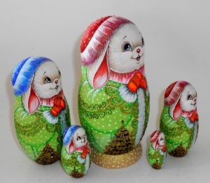 Rabbit in green coat nesting Doll Babooshki s