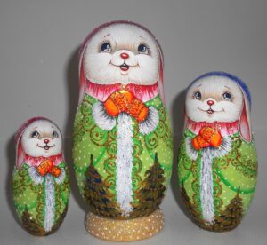 Rabbit in green coat nesting Doll Babooshki s
