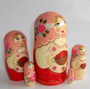Marusya with cranberries in pink and red nesting Doll Babooshki s