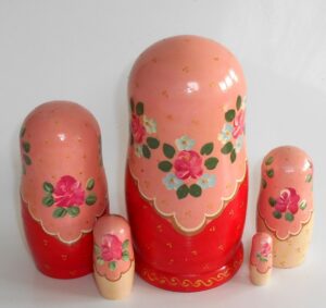 Marusya with cranberries in pink and red nesting Doll Babooshki s