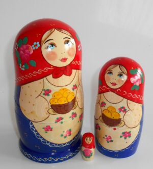 Marusya with yellow apples in red and blue nesting Doll Babooshki s