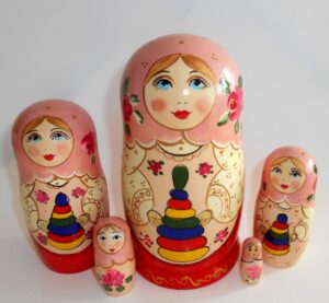 Marusya with toy pyramid in pink scarf Babushka Matryoshka nesting Doll Babooshki Babushkas